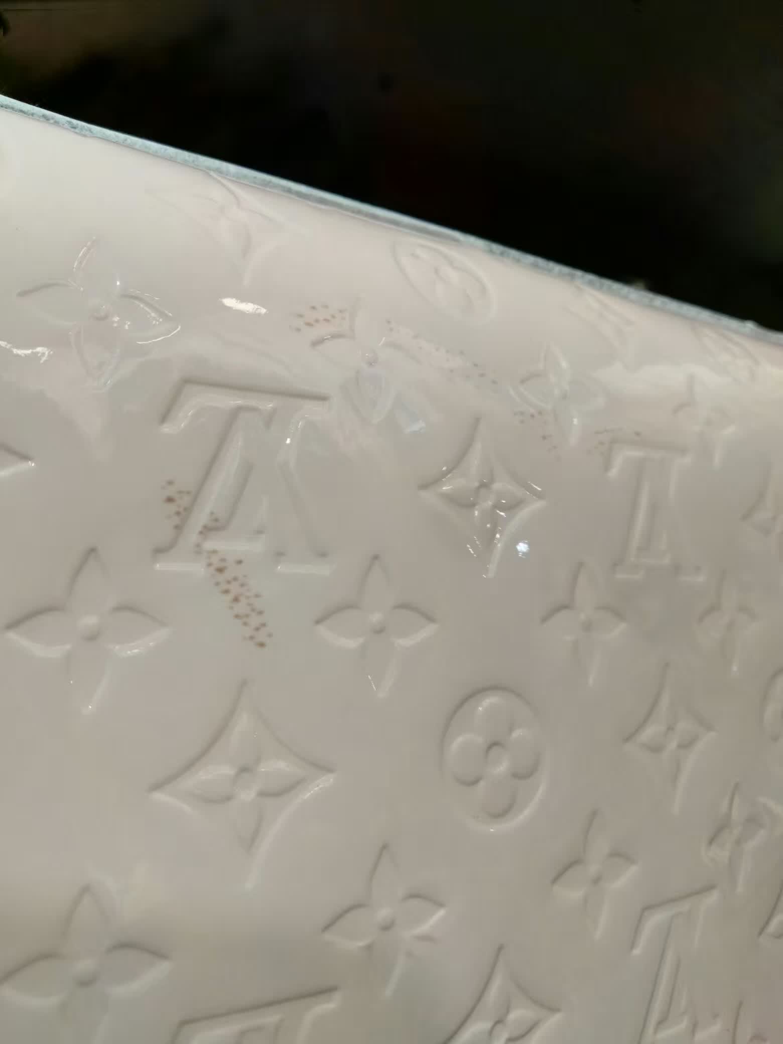 漆皮包染色